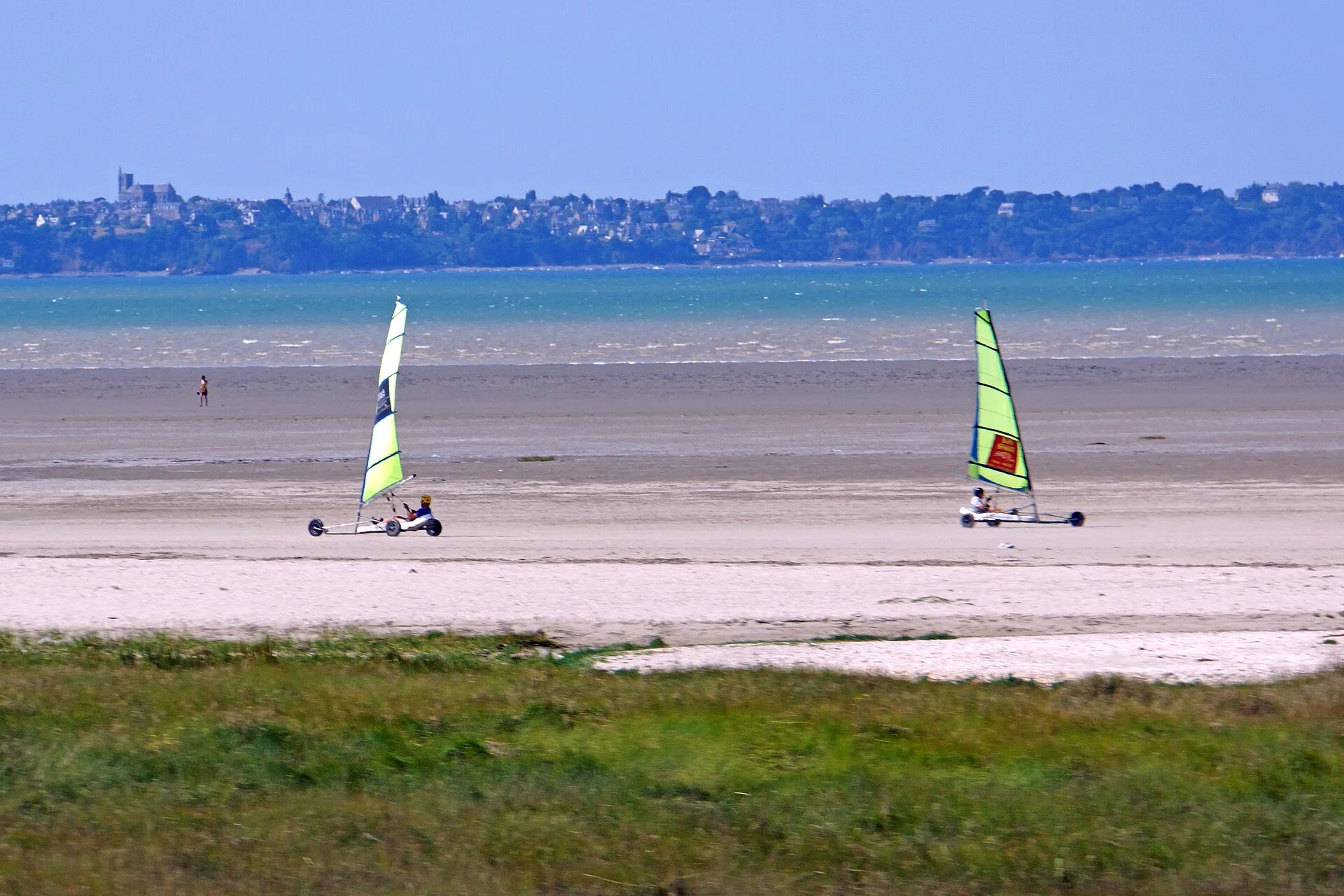 Sand yachts on the flats of the bay near Cherrueix